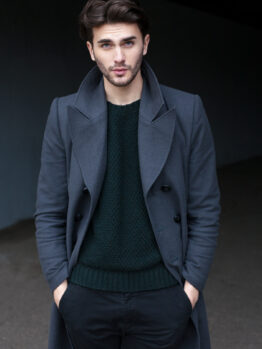 handsome young man in coat